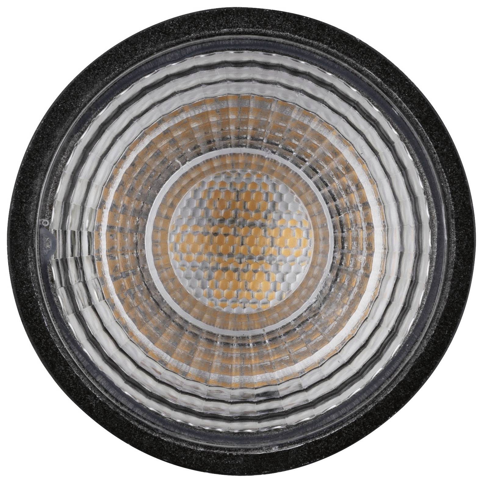 Een close-up van een rond LED-licht met concentrische cirkels in de lens. Het licht is oranje-geel in het midden.