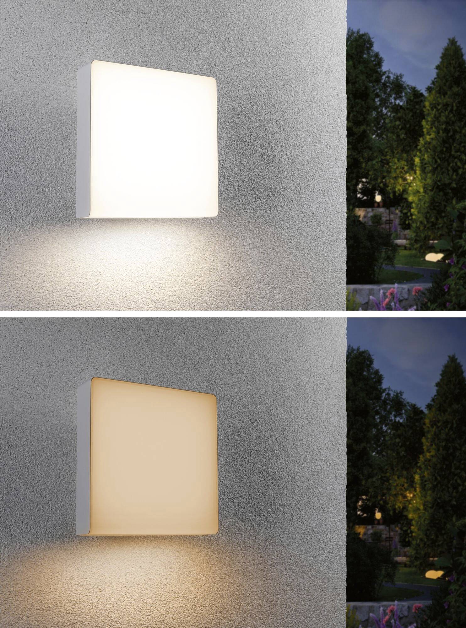 Twee buitenwandlampen schijnen op een witte muur; de bovenste lamp schijnt helderder dan de onderste, met bomen op de achtergrond bij schemer.