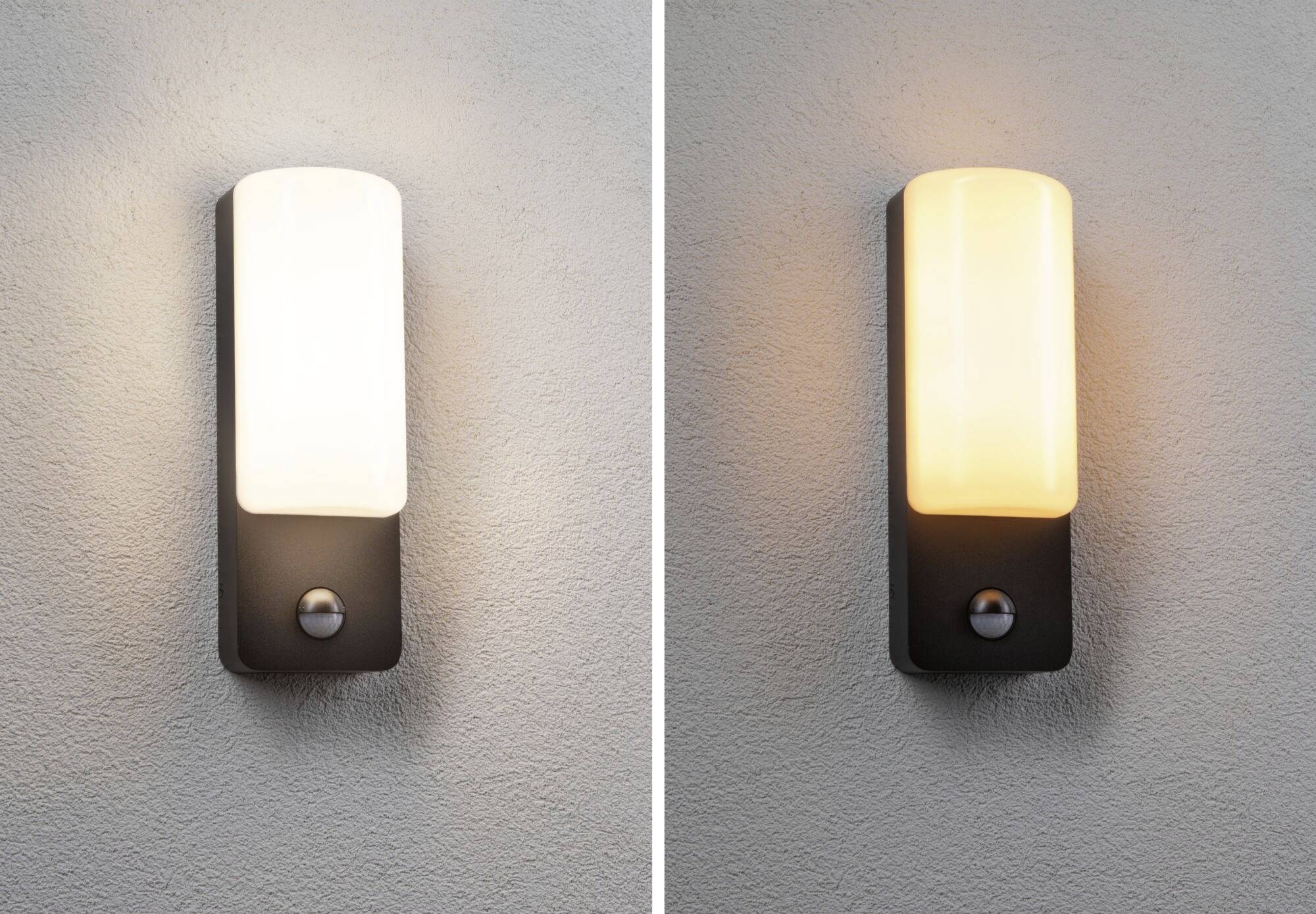 Twee wandlampen aan een muur; de linker lamp schijnt wit, de rechter warmgeel. Beide hebben een rechthoekige lampenkap.