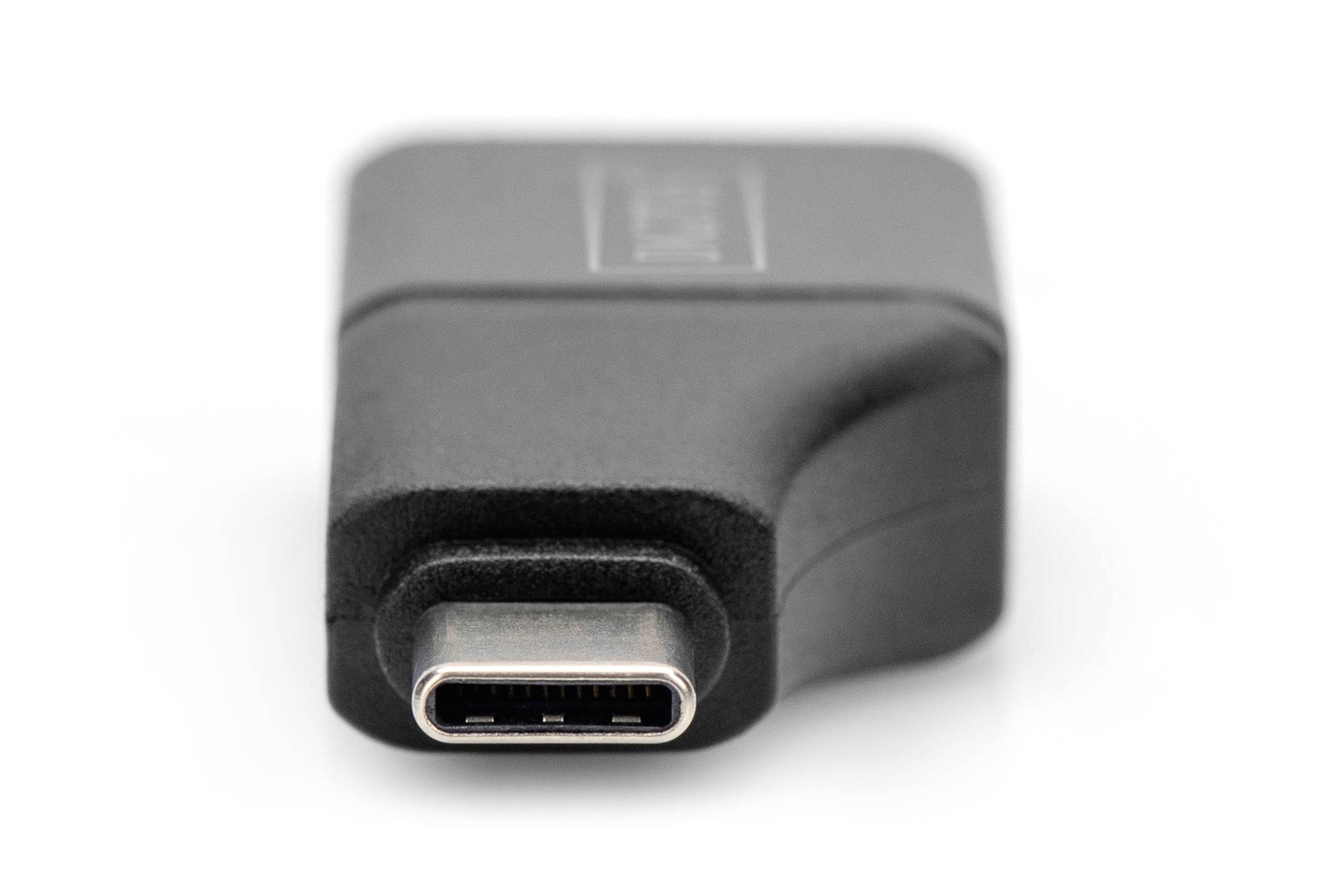 Zwarte USB-C-adapter, voorkant met aansluiting zichtbaar, rechthoekige vorm.