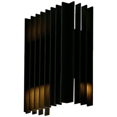 Verschillende verticale, donkere lamellen die smalle openingen vormen; enkele lamellen worden van onderen warm verlicht.