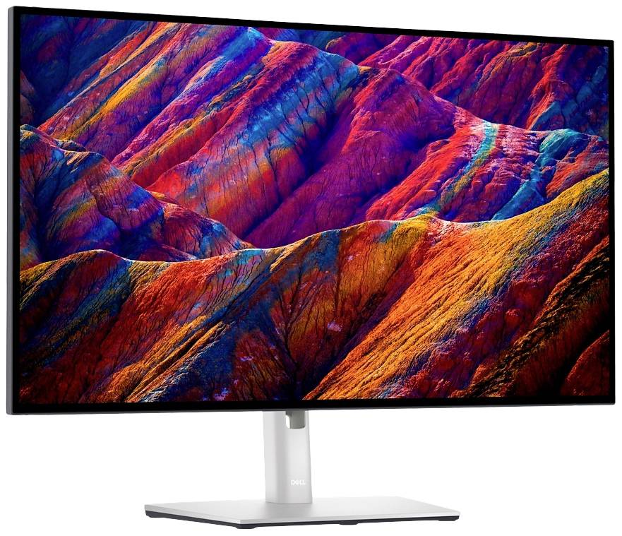 Een computerscherm toont een kleurrijk, abstract beeld dat doet denken aan bonte berglandschappen.