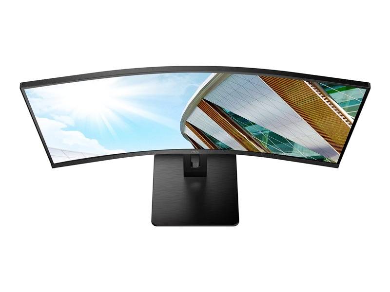 Een brede, gebogen monitor toont een modern gebouw met een blauwe lucht en zonneschijn op de achtergrond.