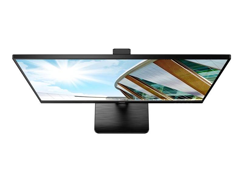 Een plat beeldscherm van bovenaf gezien, toont een blauwe lucht met zonneschijn en moderne architectuur met glazen daken.