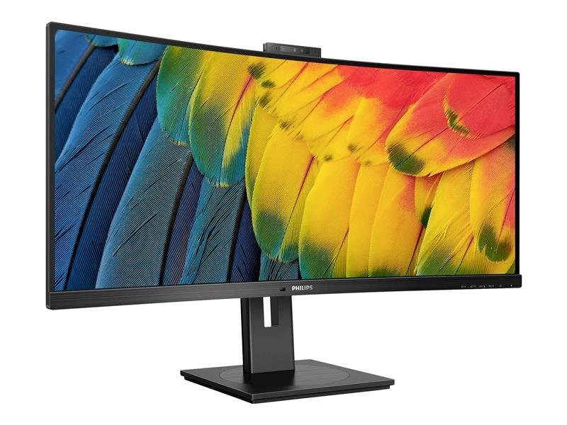 Een breedbeeldmonitor met een levendige papegaaiveren-achtergrond. De monitor heeft een smalle rand en een geïntegreerde webcam.