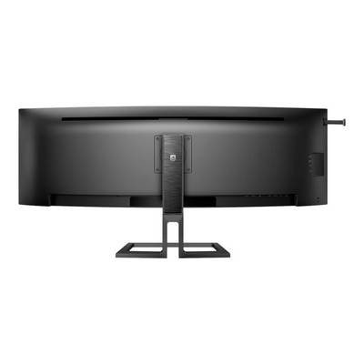 Een grote, brede computerscherm, zwart, bekeken van achteren op een rechthoekige standaard.