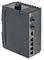 Een industriële Ethernet-switch met vijf RJ45-poorten en twee glasvezelaansluitingen, gebruikt voor robuuste netwerkverbindingen.