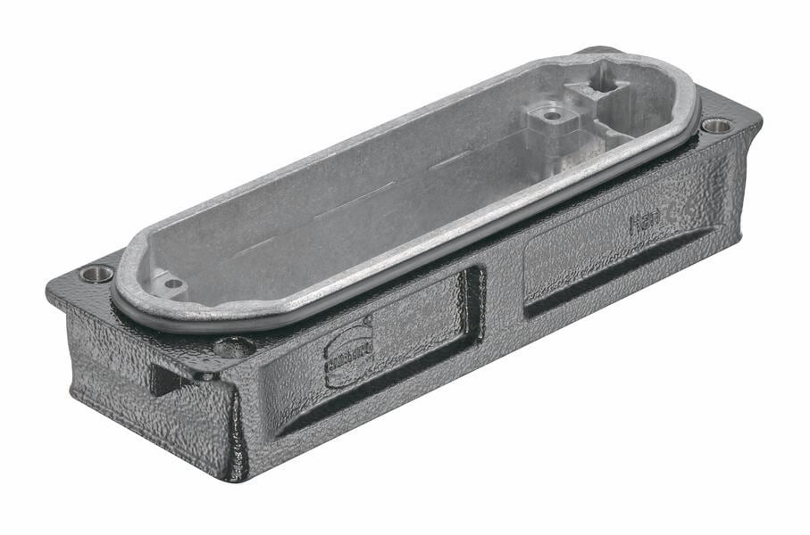 Metalen behuizing, rechthoekig, met afgeronde hoeken en schroefgaten, voor het onderbrengen van elektronische componenten.