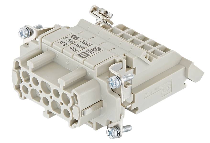 Een rechthoekige, beige stekkerverbinding met meerdere aansluitpunten, schroeven aan de zijkanten en technische opdruk bovenop.