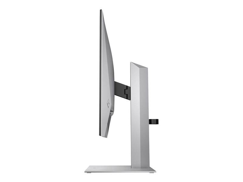 Een zijaanzicht van een moderne computermonitor. De monitor heeft een dun profiel en staat op een stevig metalen voetje.