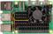 Een groen single-board computermodule met een koellichaam, ventilator en aansluitingen voor USB, HDMI en Ethernet, gezien van bovenaf.