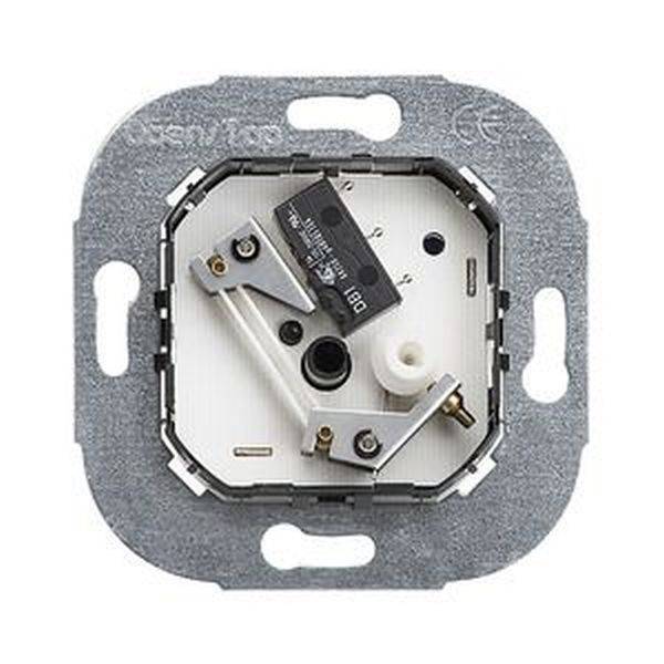 Aansluitingsmechanisme voor een lichtschakelaar, zonder de buitenste afdekking. De interne elektrische componenten zijn zichtbaar.