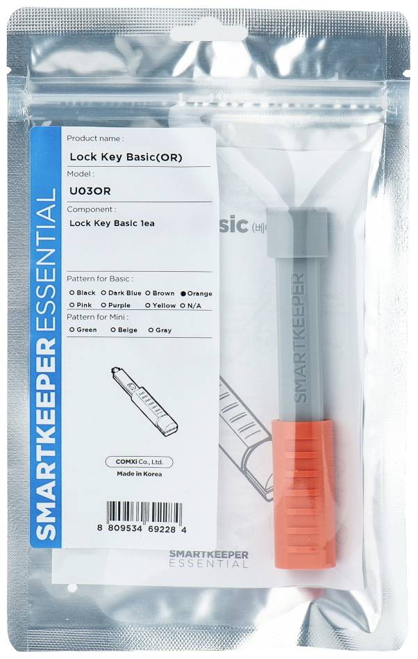 'SmartKeeper'-verpakking met een grijze veiligheidssleutel. Etiket toont productnaam, modelnummer en kleuropties.