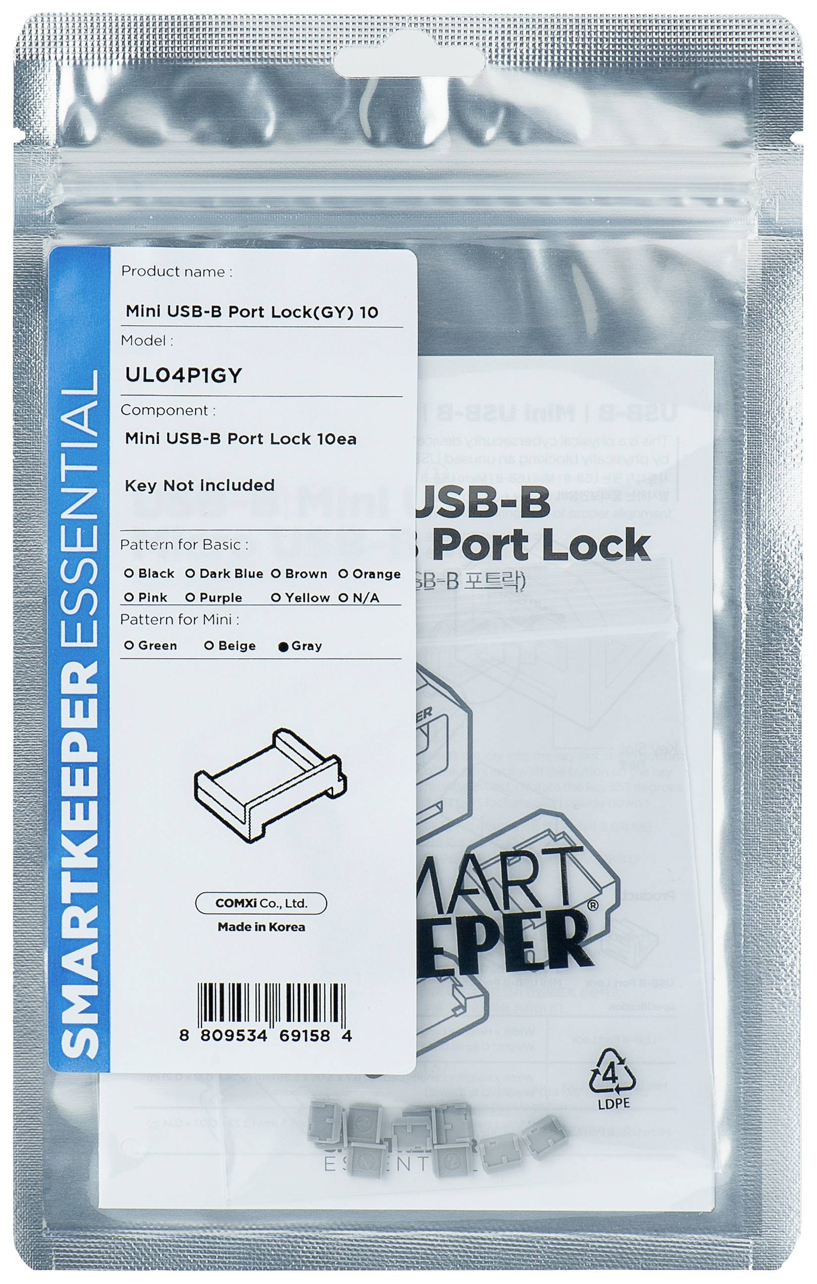 Transparante verpakking met een Mini-USB-B-poortafsluiting. Opdruk: 'Smartkeeper Essential', productdetails en fabrikatiesland.