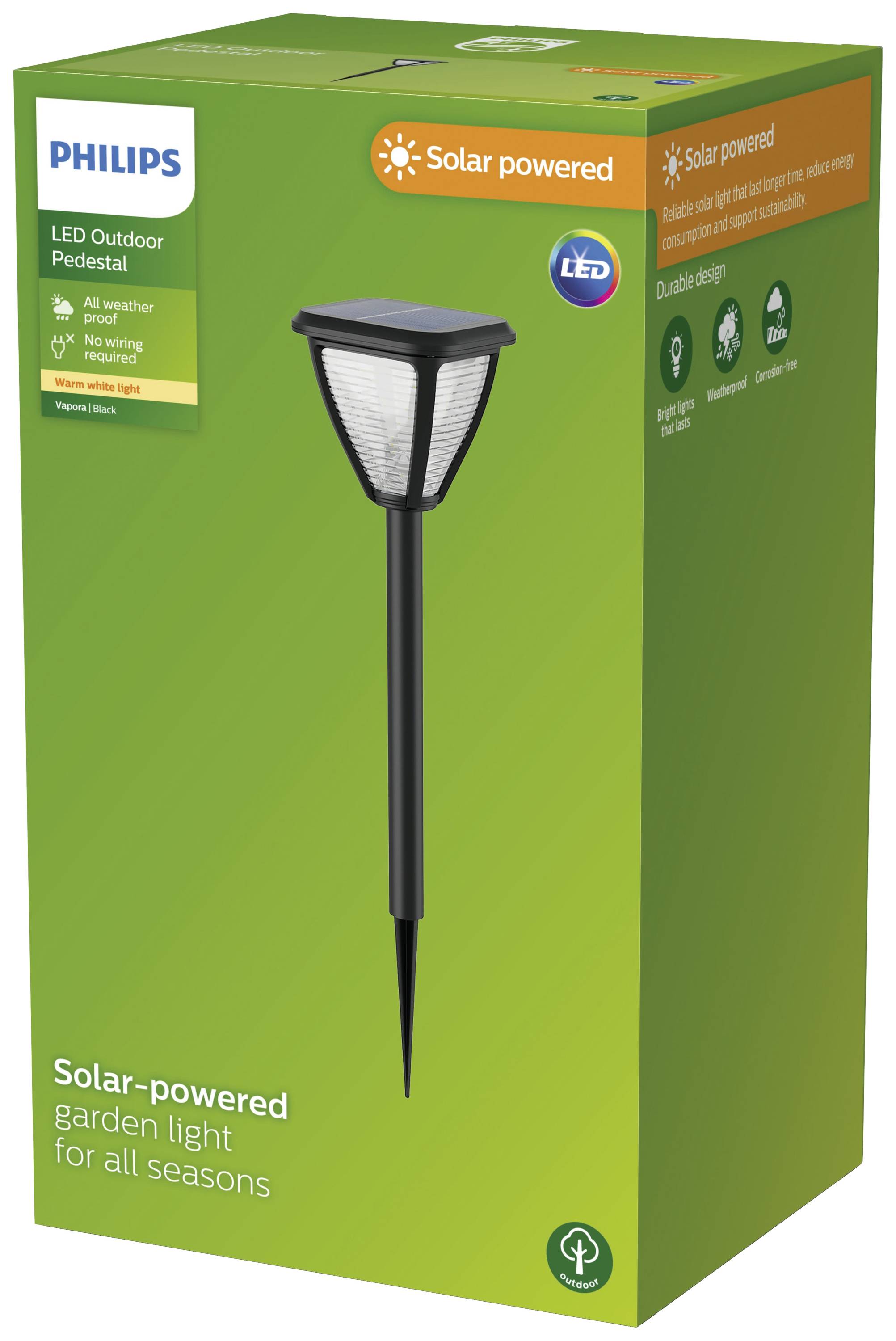 Verpakking van een zonne-energie aangedreven Philips LED-tuinlamp. Groene kartonnen doos met afbeelding van de lamp. Tekst: 'Zonne-aangedreven tuinverlichting voor alle seizoenen'.