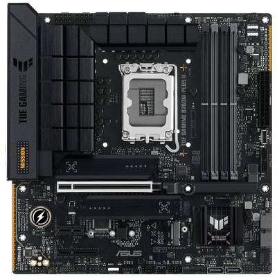 Een zwart moederbord met het opschrift 'TUF Gaming', meerdere RAM-sleuven en een CPU-socket in het midden.