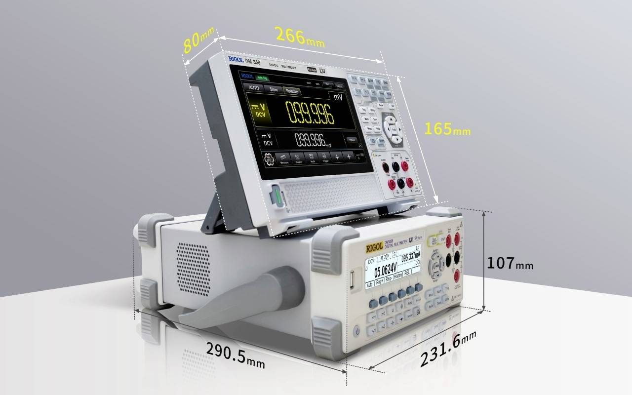 Een elektronisch meetapparaat met display en toetsen, gemonteerd op een behuizing. Afmetingen: 266 mm breedte, 165 mm hoogte, 107 mm diepte.