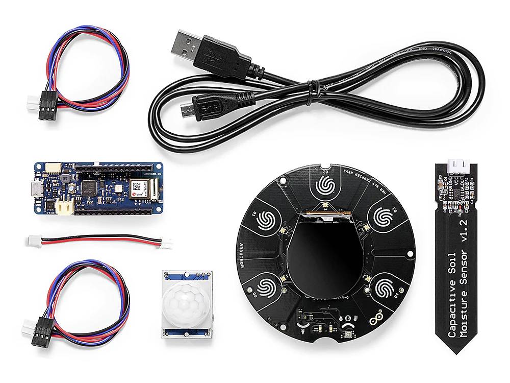 Elektronische componenten en kabels voor een Arduino-project, waaronder sensoren en USB-kabels, geschikt voor DIY-ontwikkelingsprojecten.