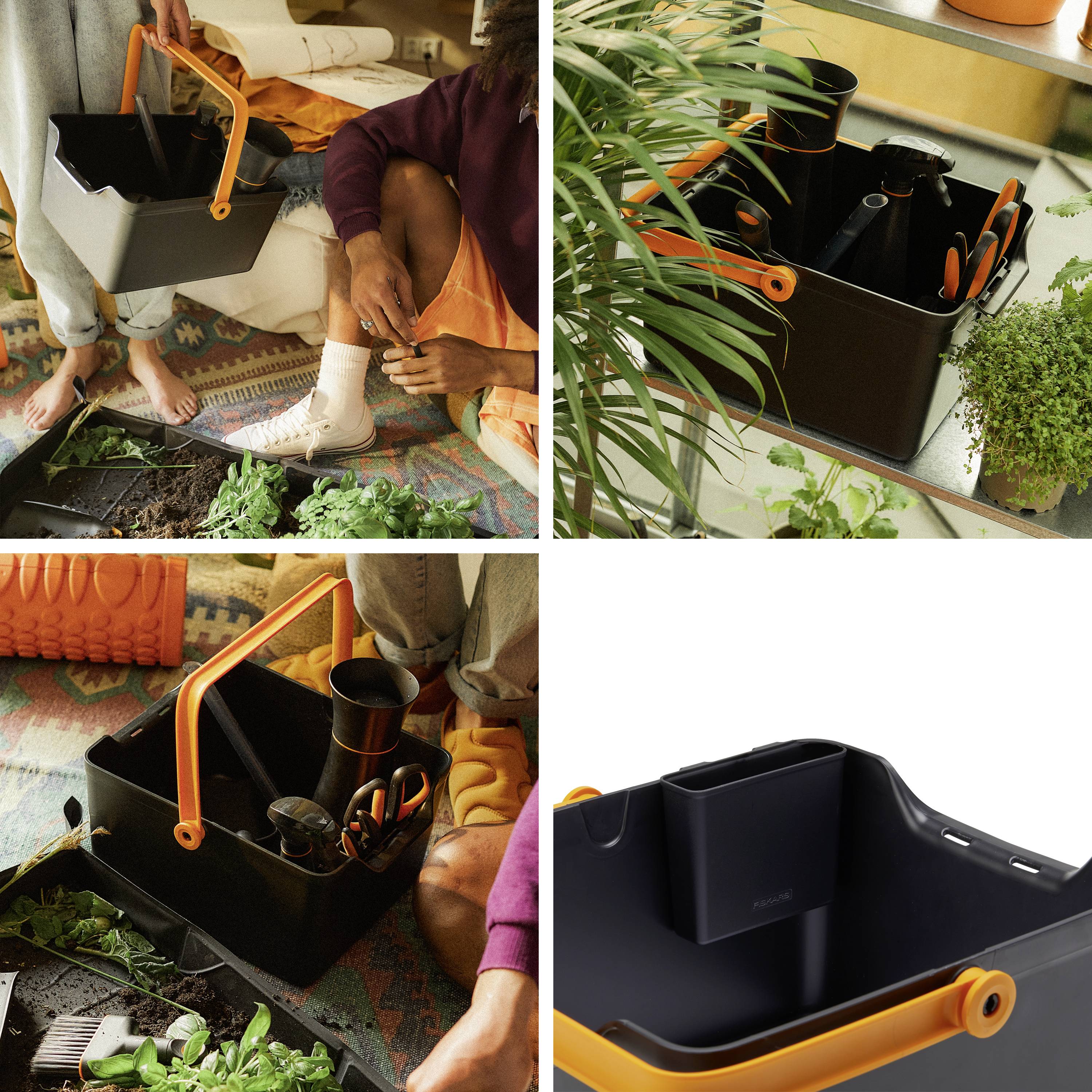 Een zwarte tuinbox met een oranje handvat bevat gereedschappen en planten. Personen planten samen in een binnenruimte.