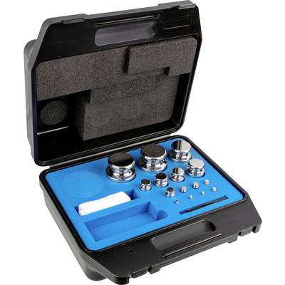 'Zwarte opbergkoffer met blauwe schuimvulling, die verschillende metalen gewichten in verschillende formaten bevat.'