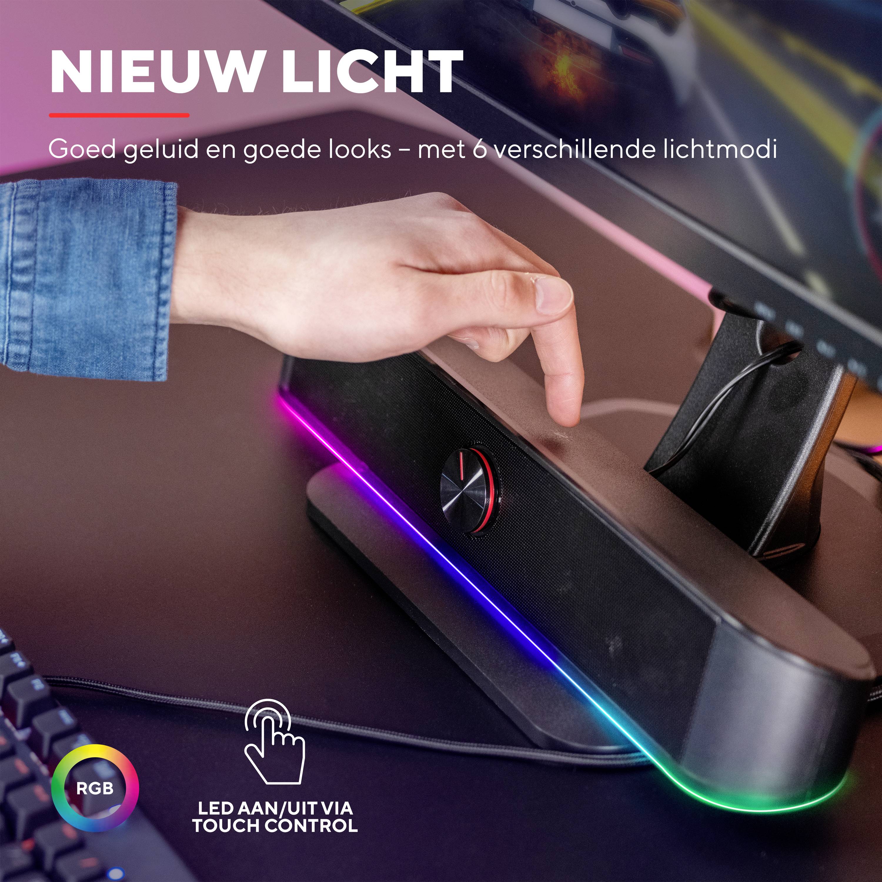 Een hand raakt een luidspreker met LED-verlichting aan, waarbij de tekst 'Er zij licht' eronder staat. RGB-kleuren en touch-bediening worden benadrukt.