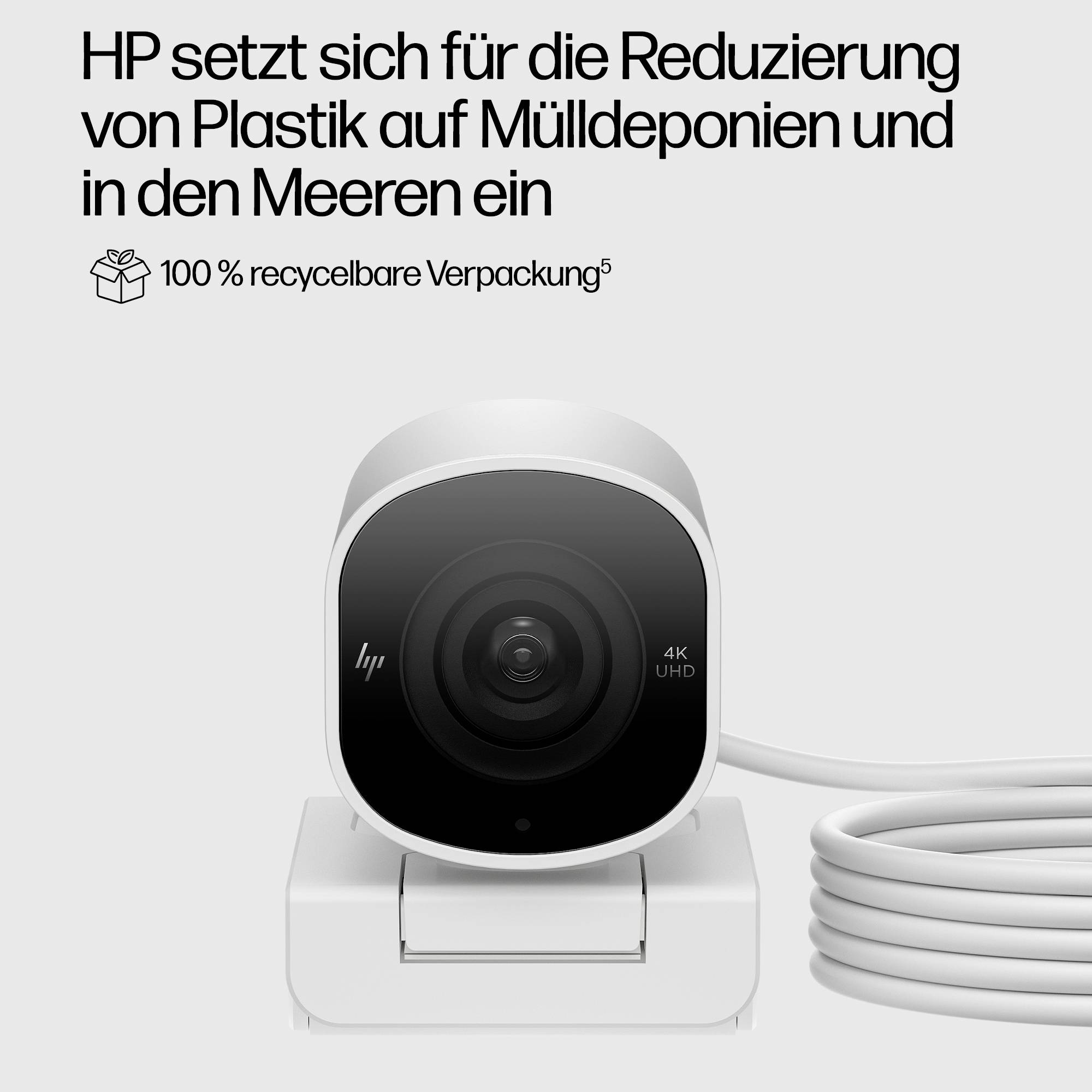 Een bewakingscamera met een wit behuizing van HP. Koptekst benadrukt HPs inspanningen om plastic afval en plastic in zee te verminderen. Verpakking 100% recyclebaar.