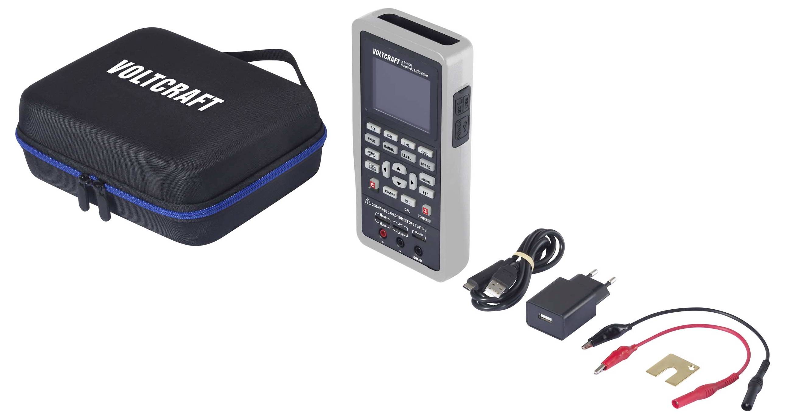 Elektronisch meetapparaat met scherm en toetsenbord, oplader, kabel en etui. Toebehoren voor nauwkeurige elektrische metingen.