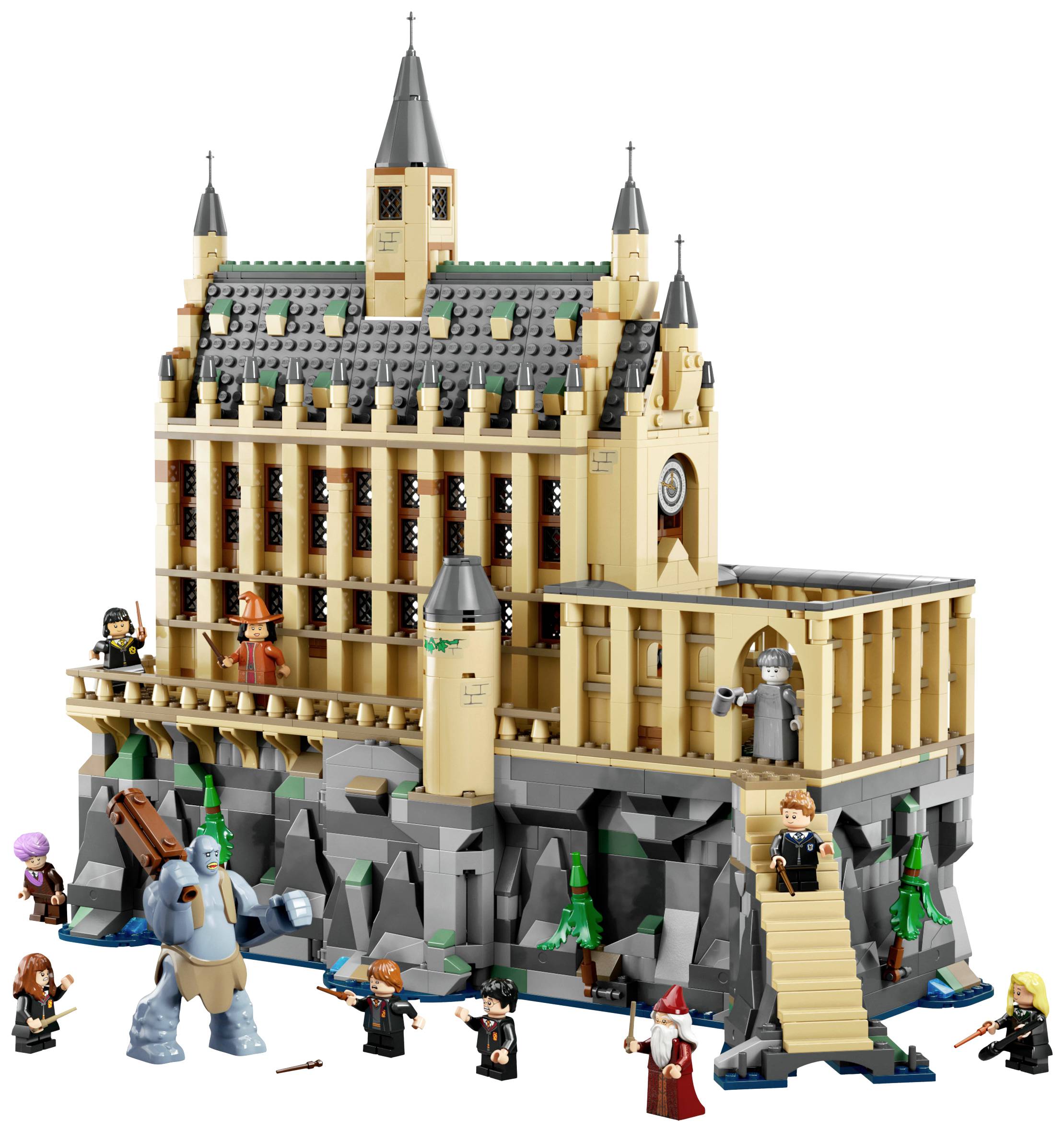 Een LEGO-set toont een kasteel, omringd door figuren uit een fantasiewereld die scènes met verschillende wezens en personages voorstellen.