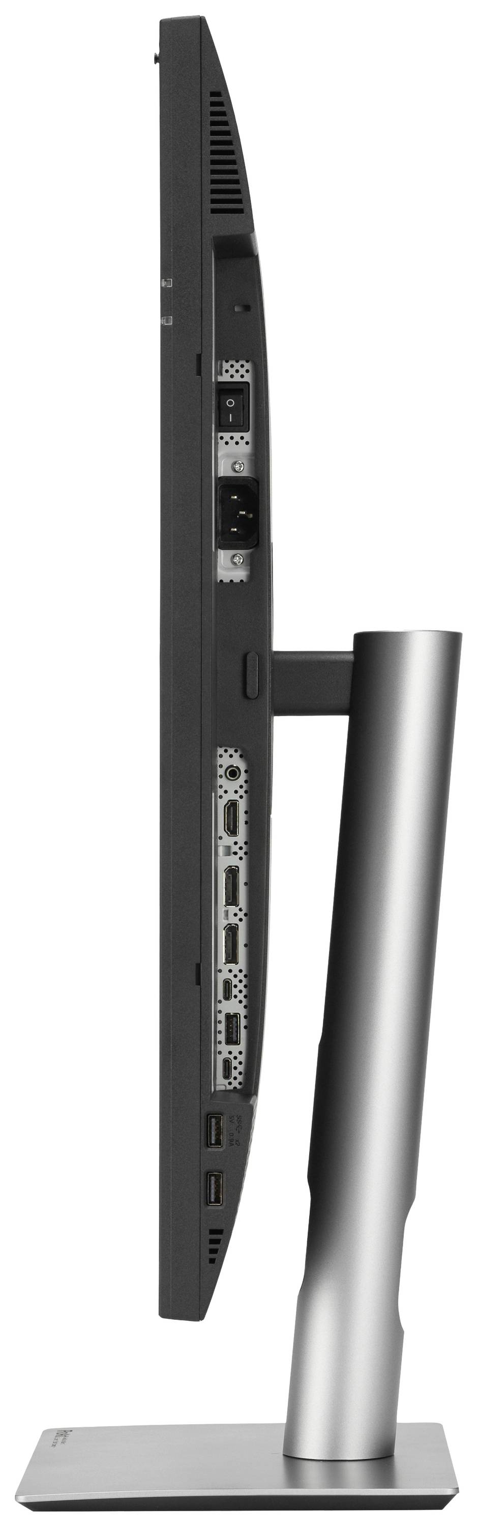 Zijaanzicht van een computerscherm met slanke vormgeving en verstelbare standaardhoogte. Aansluitingen aan de achterkant zichtbaar.