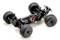 RC-auto-chassis met grote, geprofileerde banden, veren schokdempers en motorbekabeling. Geschikt voor oneffen terrein.
