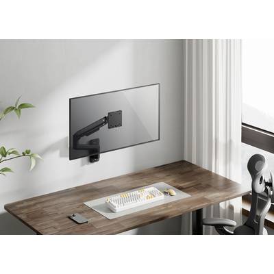 Een moderne bureau met een houten oppervlak, met daarop een toetsenbord en smartphone. Aan de muur is een verstelbare monitorsteun bevestigd.