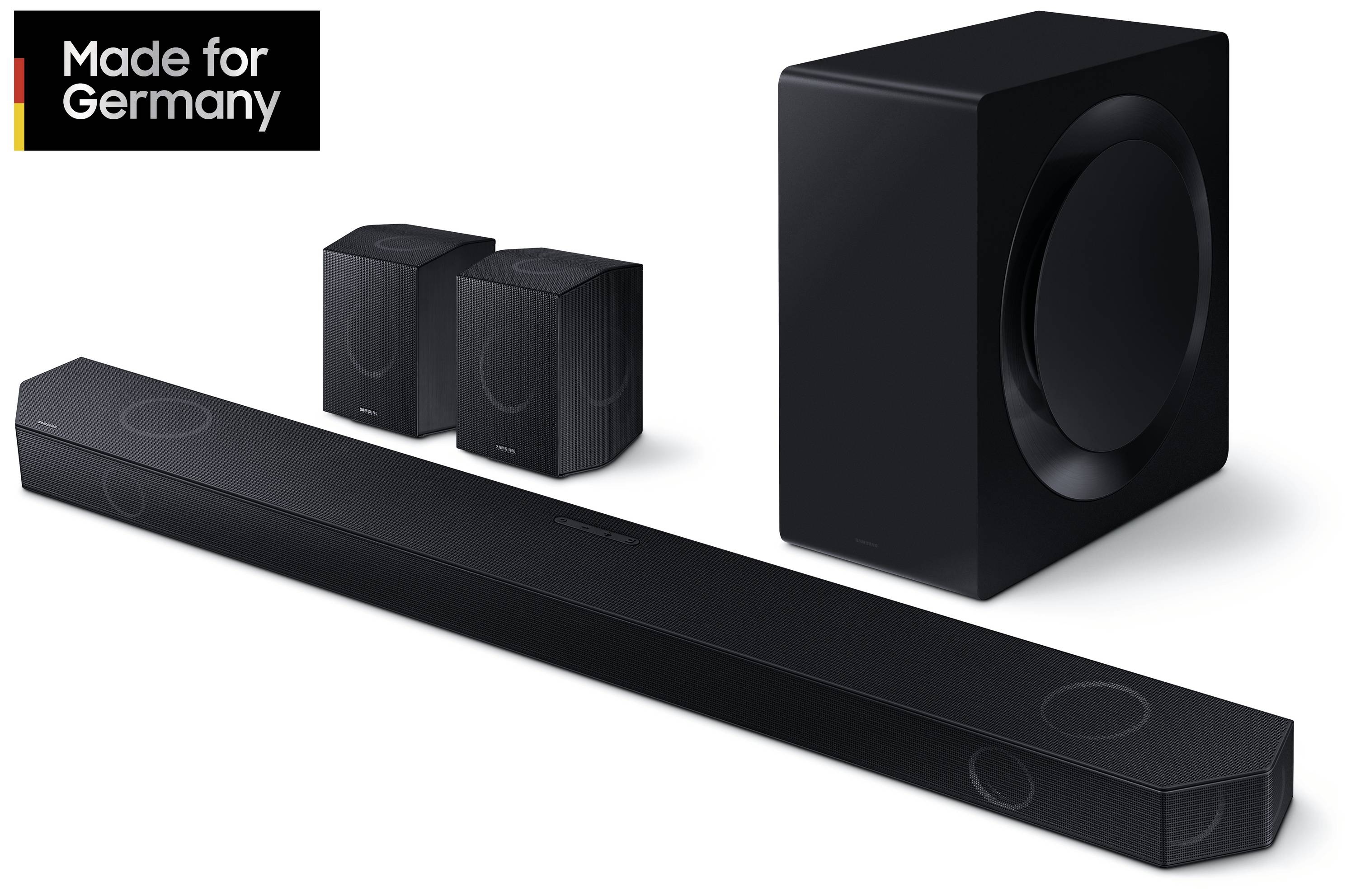 Zwarte soundbar met twee luidsprekers en subwoofer. Tekst op de afbeelding: 'Gemaakt voor Duitsland'. Audiosysteem in modern design.