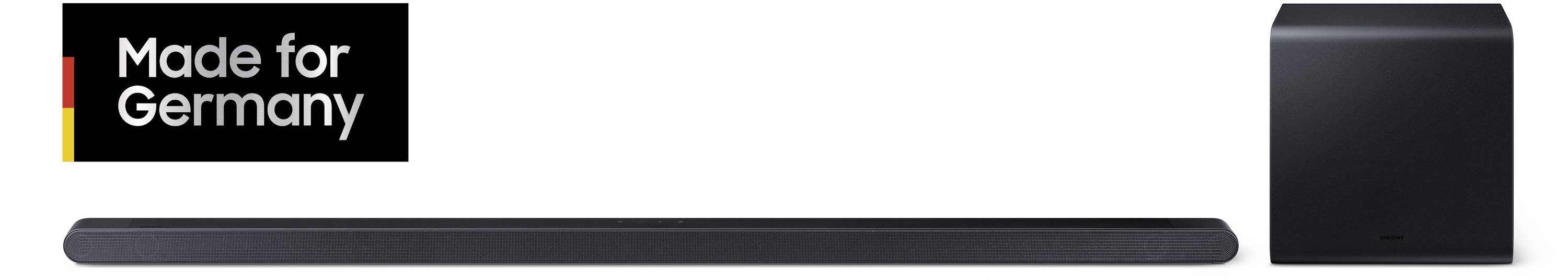 Zwarte soundbar en subwoofer met de tekst 'Made for Germany' linksboven. Audiouitrusting, gericht op geluidskwaliteit en design.