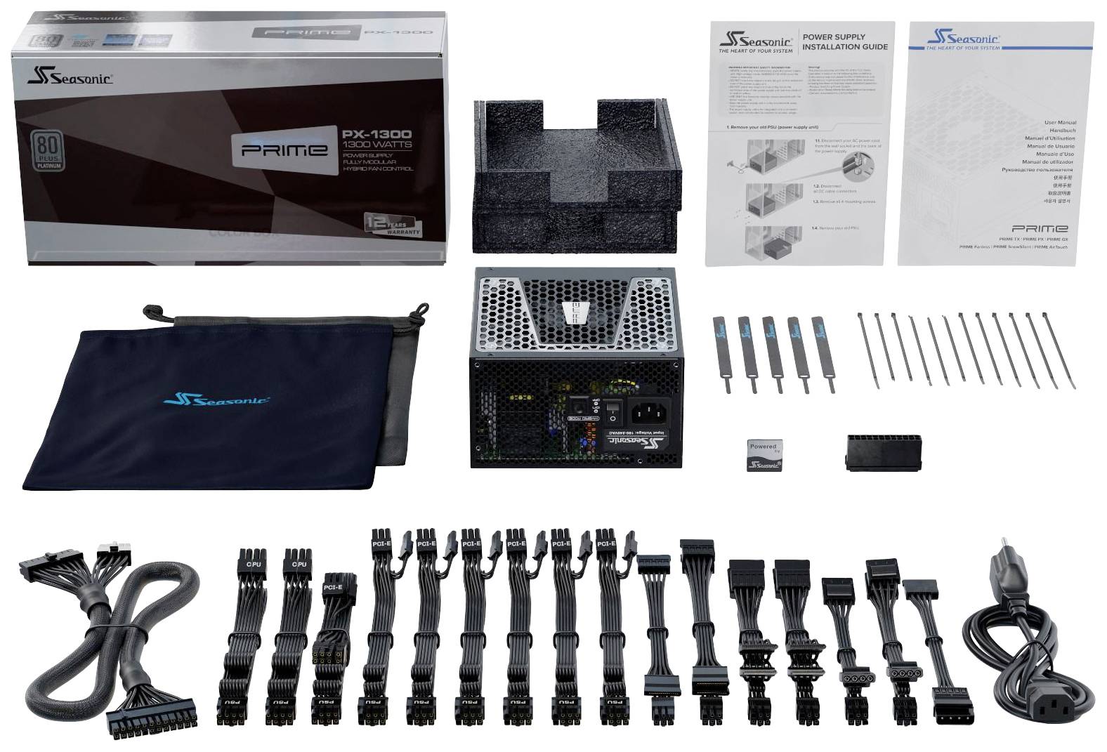 Voeding met toebehoren: stroomkabel, adapter, handleiding en schroevendraaier. Model 'Seasonic PRIME TX-1300', 80 PLUS Titanium gecertificeerd.