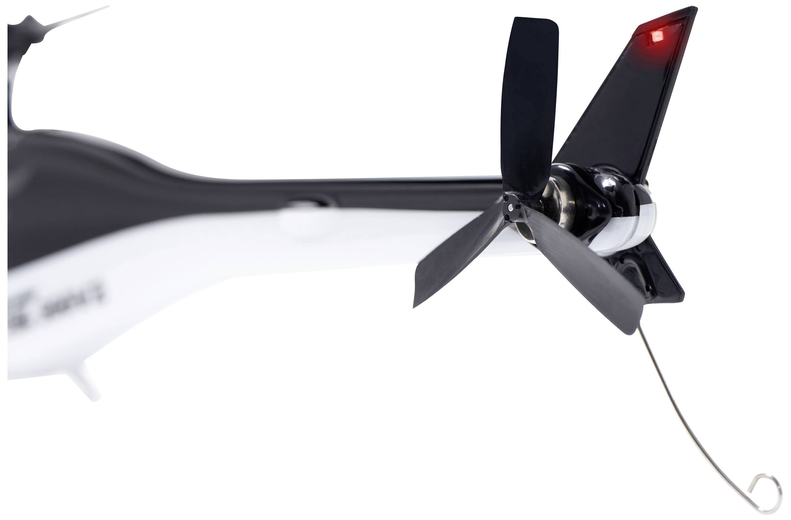 Close-up van een zwart-witte drone-rotor met een rood lampje.