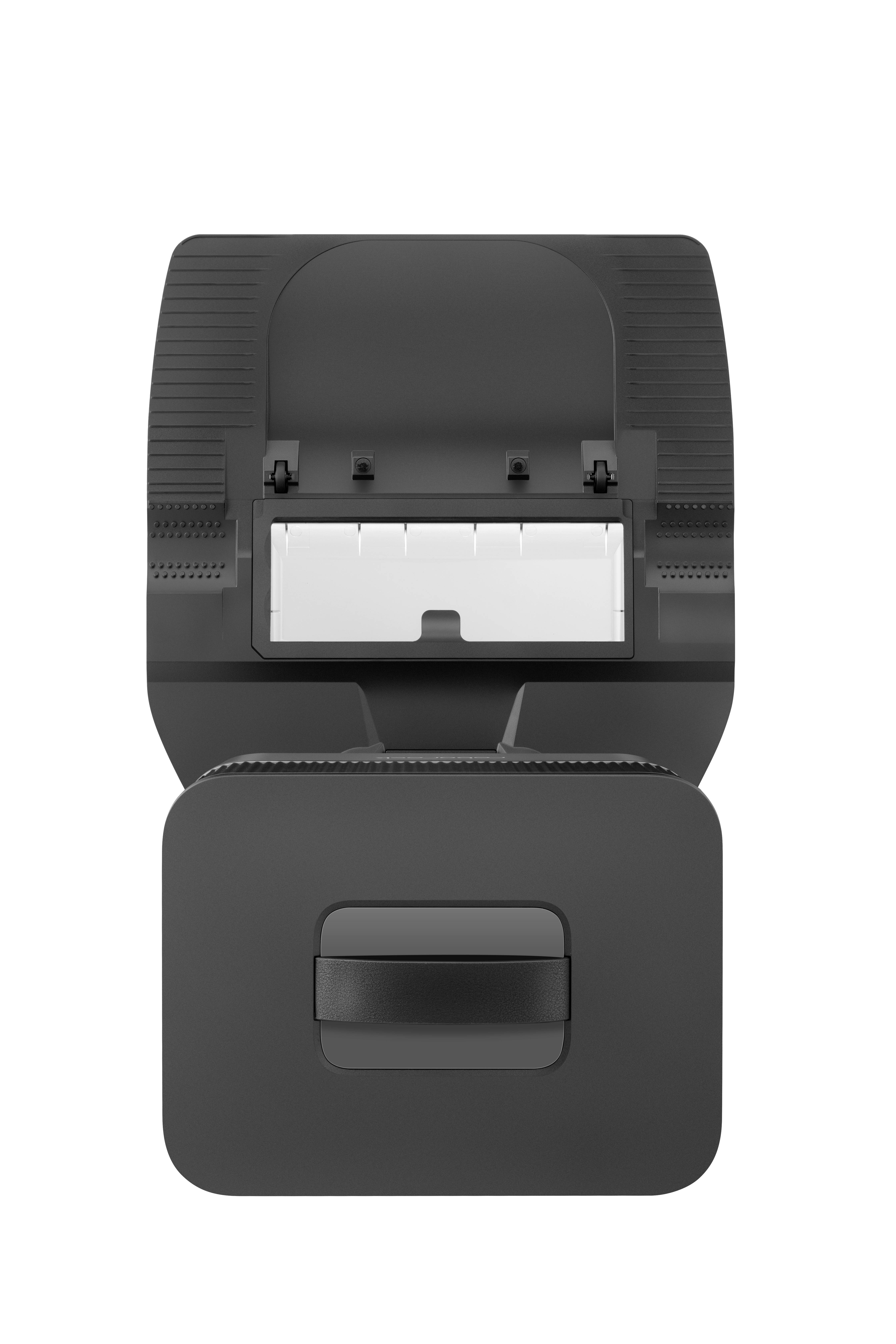 Zwarte labelprinter van bovenaf gezien, open vak voor etikettenrollen. Apparaat klaar om een nieuwe etikettenrol te plaatsen.