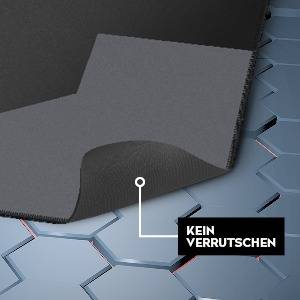 Zwarte antislipmat met zeshoekig patroon op de vloer. Tekst 'Niet verschuiven' verduidelijkt de antislip-eigenschap.