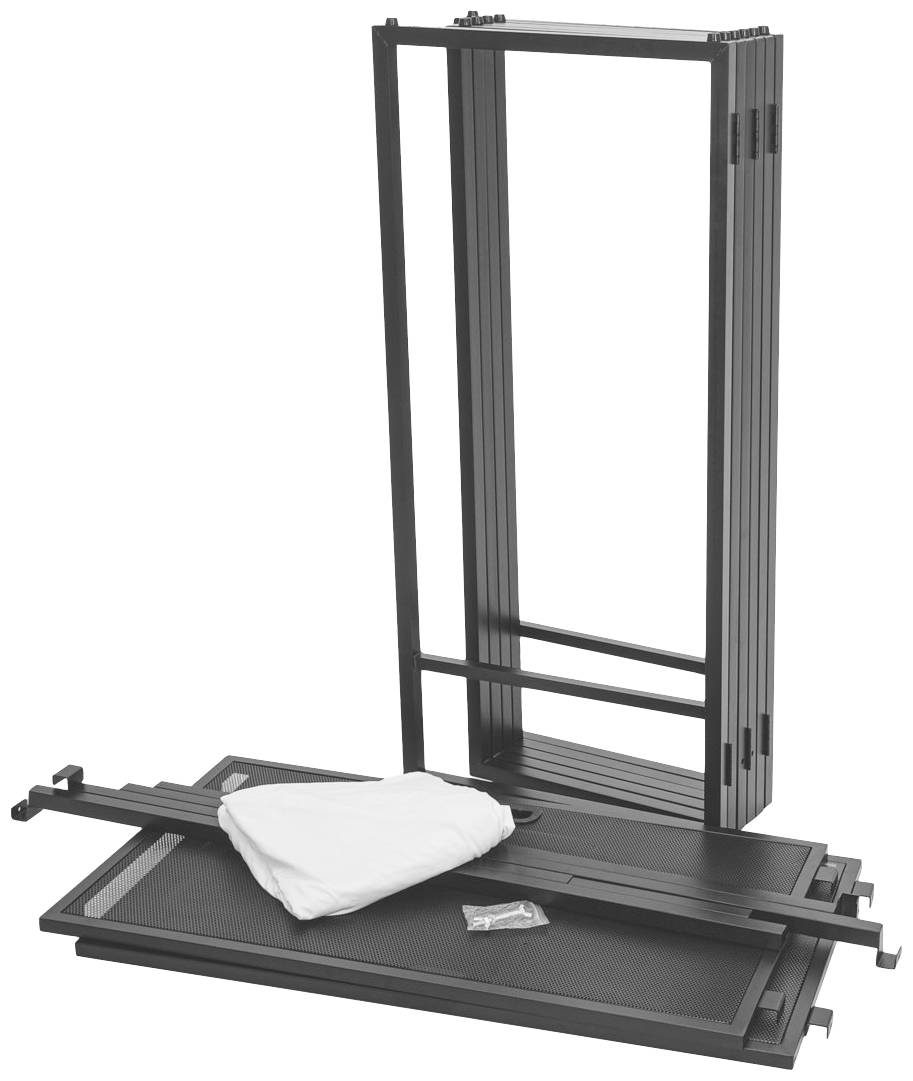 Metalen frame en tafelpoten, deels gemonteerd, met een kleine witte tas en schroeven op de vloer.