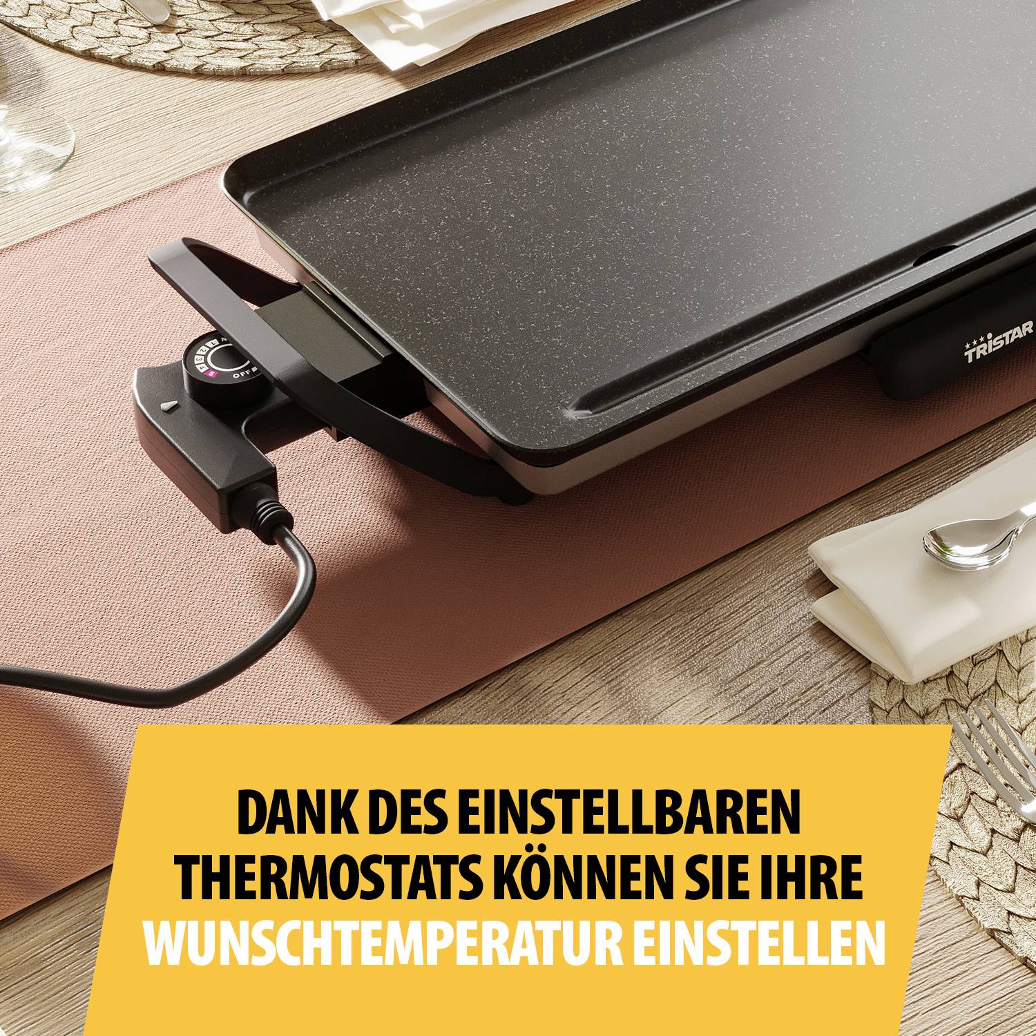 Een tafelgrill met instelbare thermostaat op een tafelloper. De tekst luidt: 'Dankzij de instelbare thermostaat kunt u uw gewenste temperatuur instellen'.