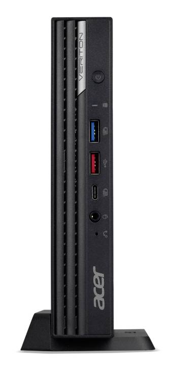 Een zwarte Acer-pc in towerformaat met meerdere USB-poorten en bedieningselementen aan de voorkant op een standaard.