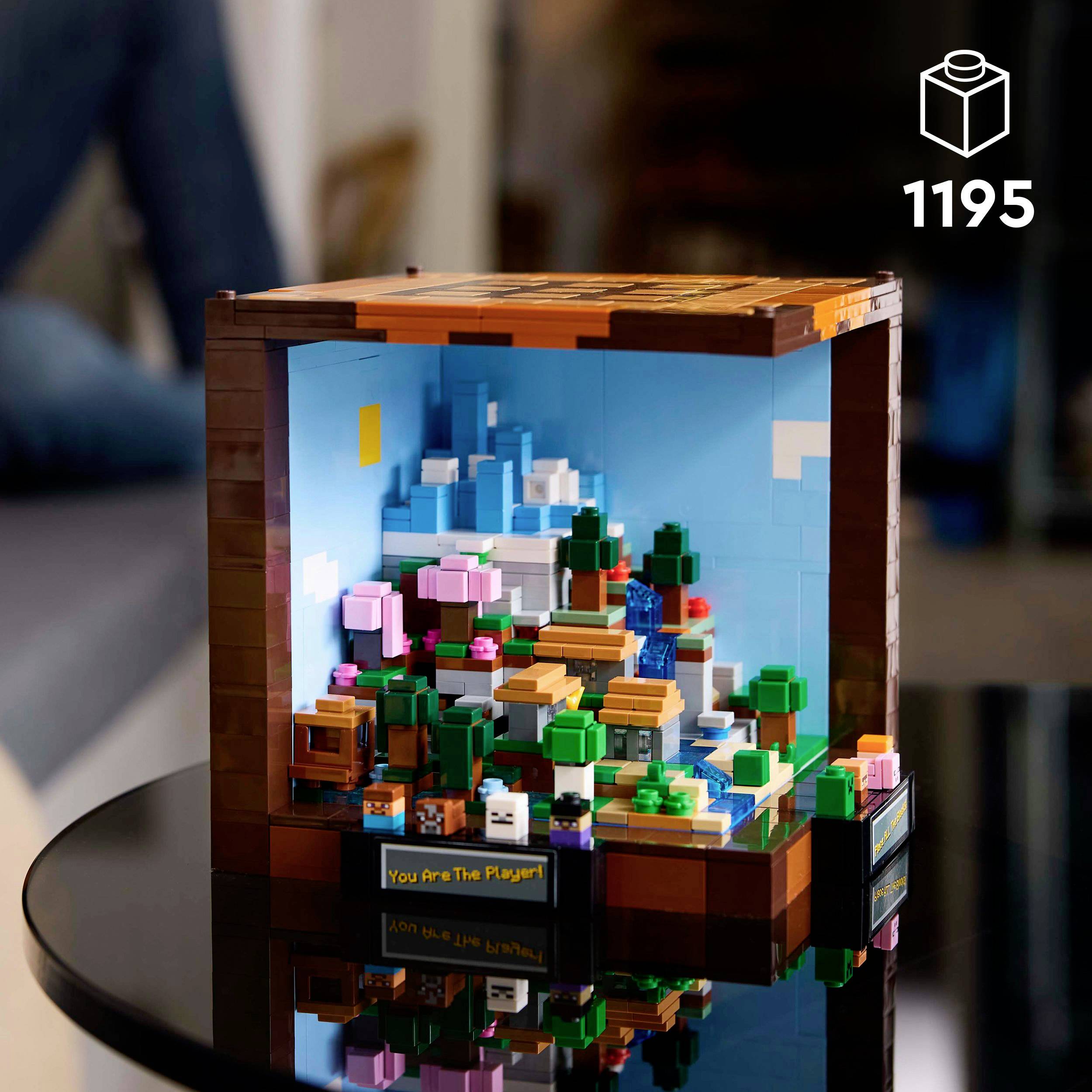 Een Lego-set toont een kleurrijke scène met planten en meubels in een vierkante lijst. Rechtsboven staat '1195'.