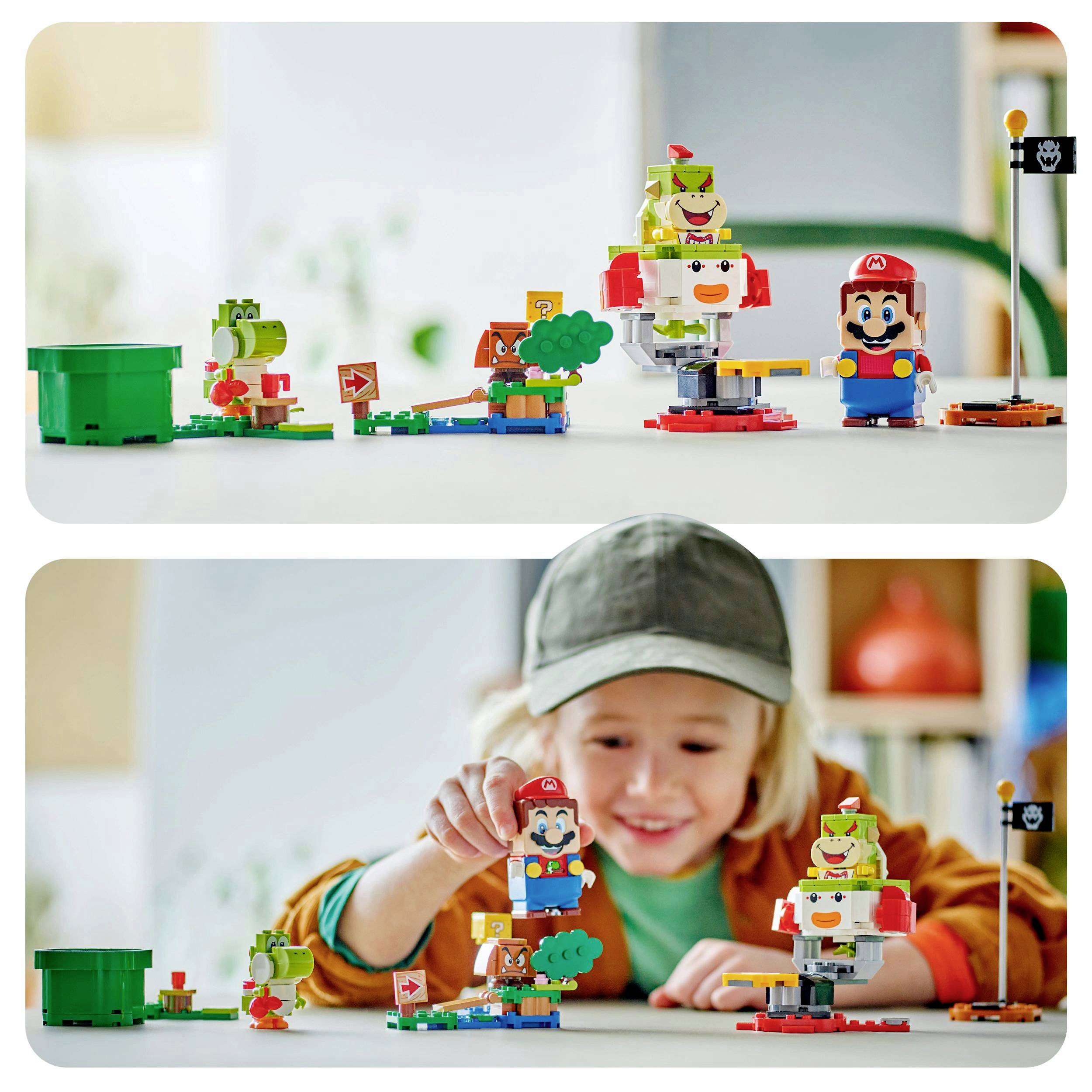 Een kind speelt met Mario- en Yoshi-figuurtjes gemaakt van bouwblokken. De figuren staan op een tafel geplaatst. Het kind draagt een pet en glimlacht.