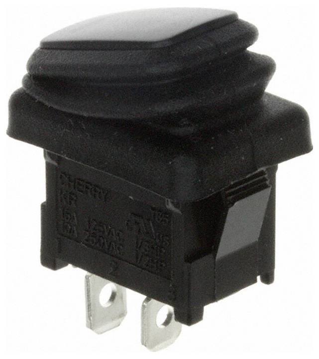 Een zwarte rechthoekige drukknoopschakelaar met metalen pennen voor elektrische aansluitingen, gelabeld 'CHERRY', 12V 125VAC.