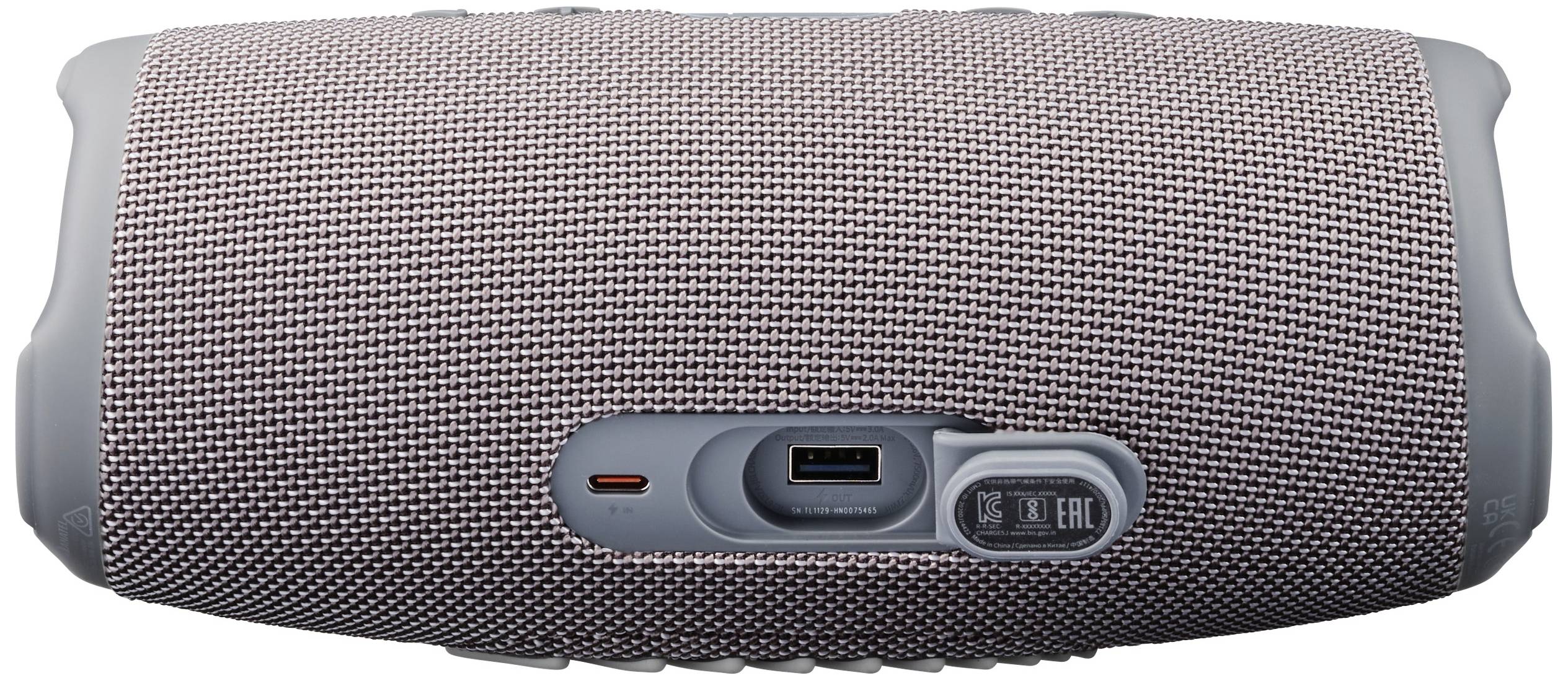 Draagbare Bluetooth-speaker in grijs met USB-laadaansluiting en controlelampjes aan de voorkant. Ideaal voor mobiele muziek.