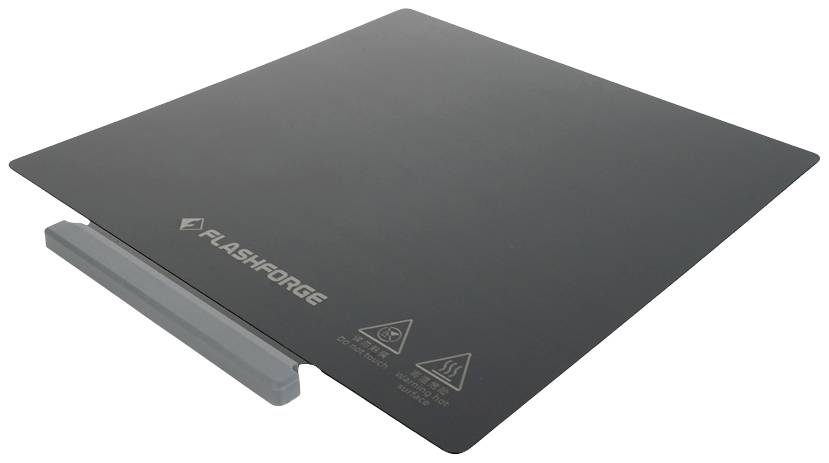 'Flashforge' magnetische bouwplaat, zwart met grijze greep. Veiligheidswaarschuwingen en handelsmerken zijn bedrukt.
