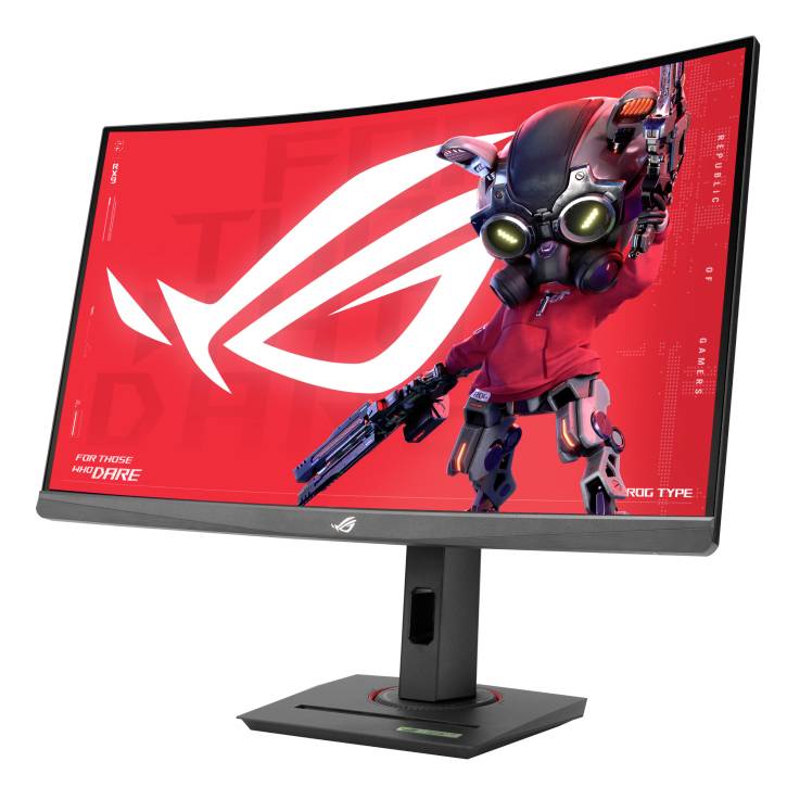 Een gebogen gamingmonitor met een rood scherm toont een robot-mascotte. Opschrift 'For Those Who Dare' en 'ROG'.