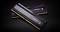 Twee RAM-modules van het merk 'Trident Z5' met een zwarte heatsink, gerangschikt op een carbonoppervlak.