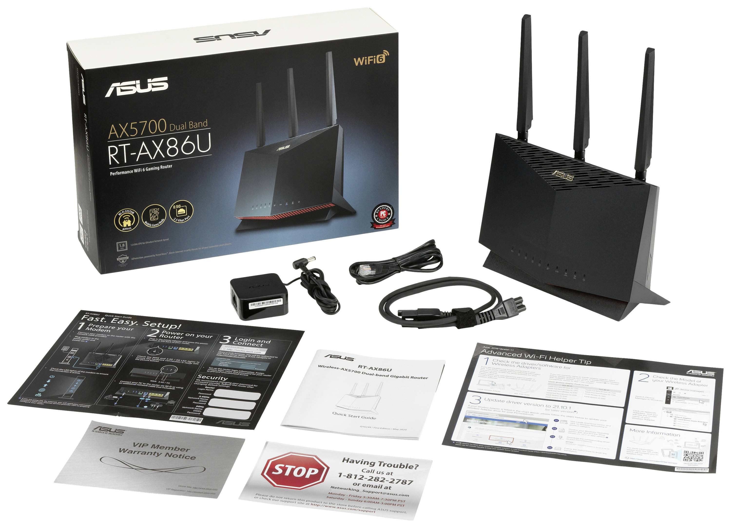'ASUS AX5700 Dual Band RT-AX86U' Router met toebehoren in de leveringsomvang zoals voedingsadapter, kabels en handleidingen. Verpakking op de achtergrond.