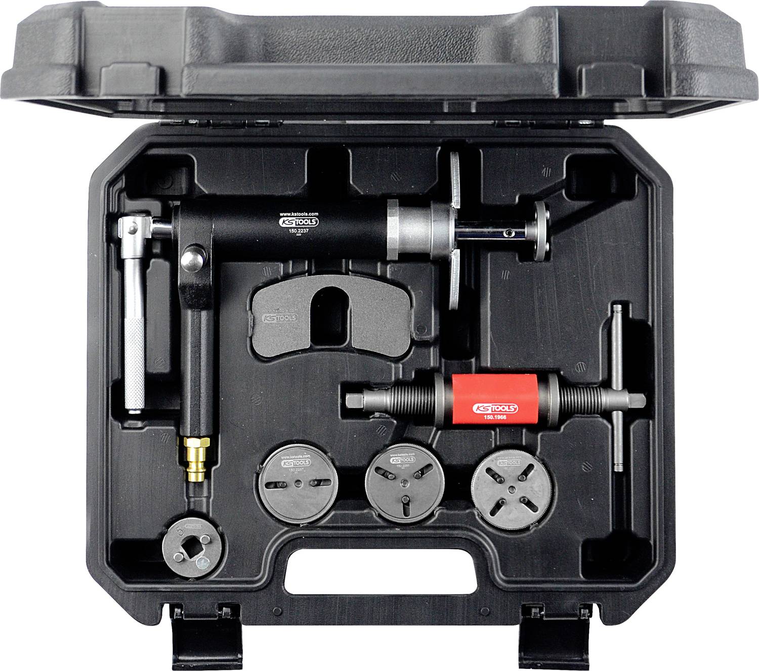 Gereedschapskoffer met verschillende opzetstukken voor buisreparaties, inclusief persinstrument en draadsnijders.