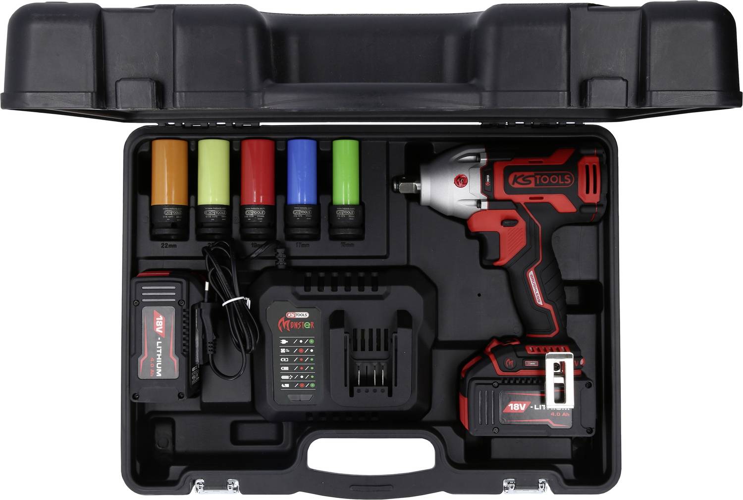 Accuschroefboormachine-set in een open zwarte koffer, bevat accuschroefboormachine, oplader, vier gekleurde opzetstukken en gebruiksaanwijzing.